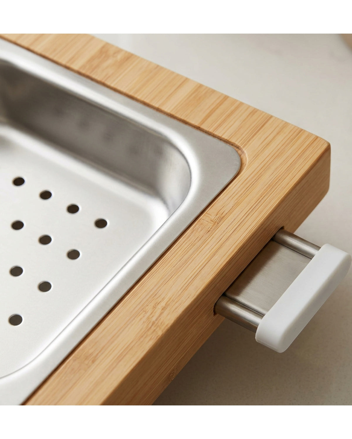 Rawer Bamboo Over-Sink Cutting Board with Steel Colander 52 cm - Detail view
